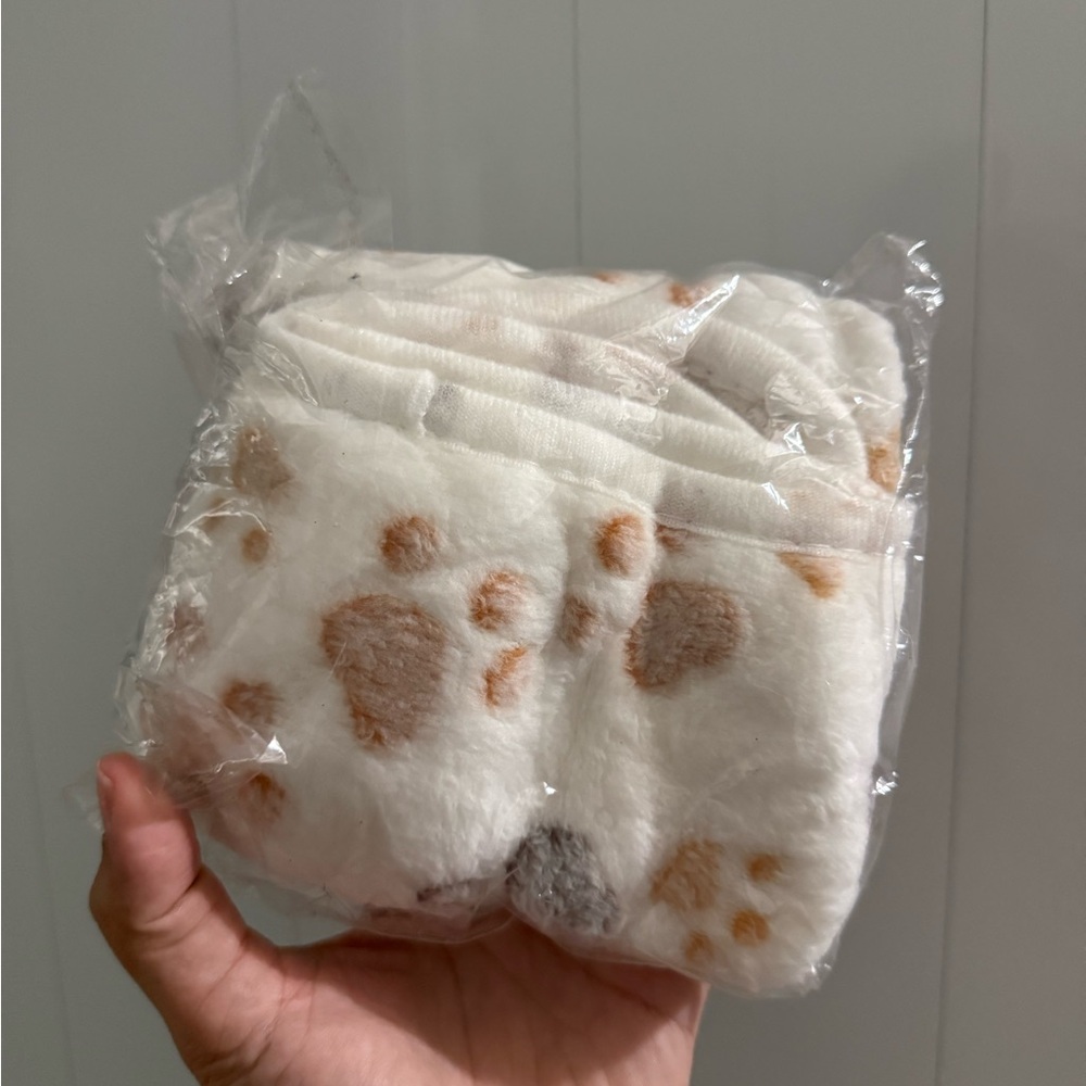White and Brown Paw Print Blanket